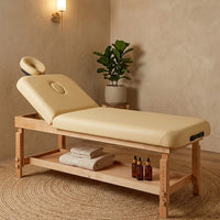 Table de massage fixe en bois Margaux Confort, hauteur réglable et étagère de rangement avec serviettes et huiles