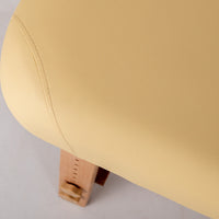 Angle arrondi et mousse 6 cm de la table de massage fixe en bois Margaux Confort, pied réglable en hêtre